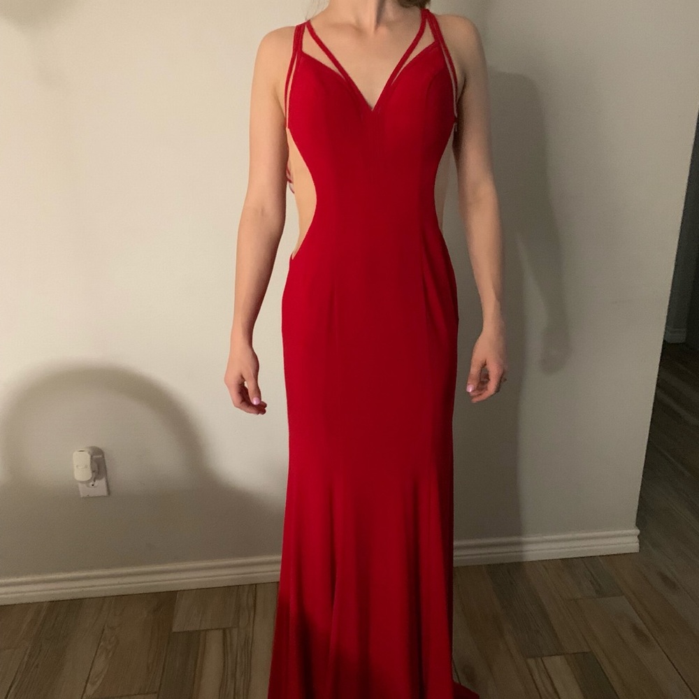 Red floor length slim fit gown.